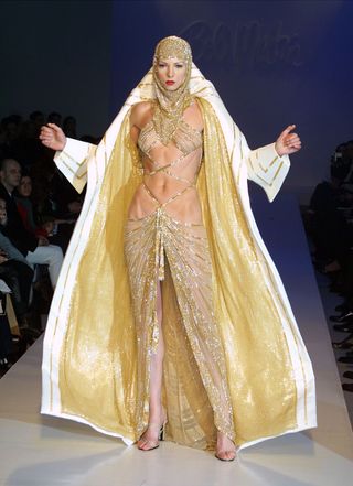 A model wears an outfit from the Bob Mackie Fall Fashion 2001 collection February 16, 2001 on the last day of Mercedes-Benz Fashion Week at Bryant Park in New York City.