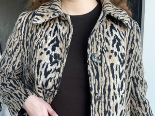 a Rixo leopard jacket styled with a brown T-shirt