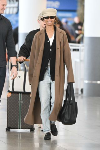 Zoe Saldana wears loafers to the airport