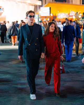 Carmen Mundt and George Russell wearing Tommy Hilfiger at the Las Vegas Grand Prix.