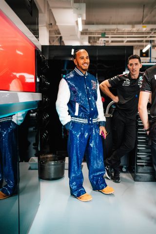 Lewis Hamilton wearing a custom blue sequin look from Tommy Hilfiger during the Las Vegas Grand Prix.