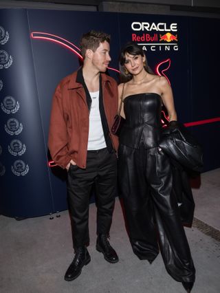 LAS VEGAS, NEVADA - NOVEMBER 23: Shaun White and Nina Dobrev attend the F1 Grand Prix of Las Vegas at Las Vegas Strip Circuit on November 23, 2024 in Las Vegas, Nevada.