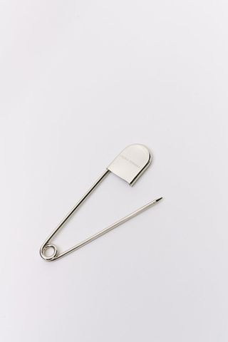 Laura Pitharas, Oversized Branded Safety Pin