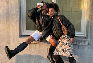 two women in stylish leather jackets and boots