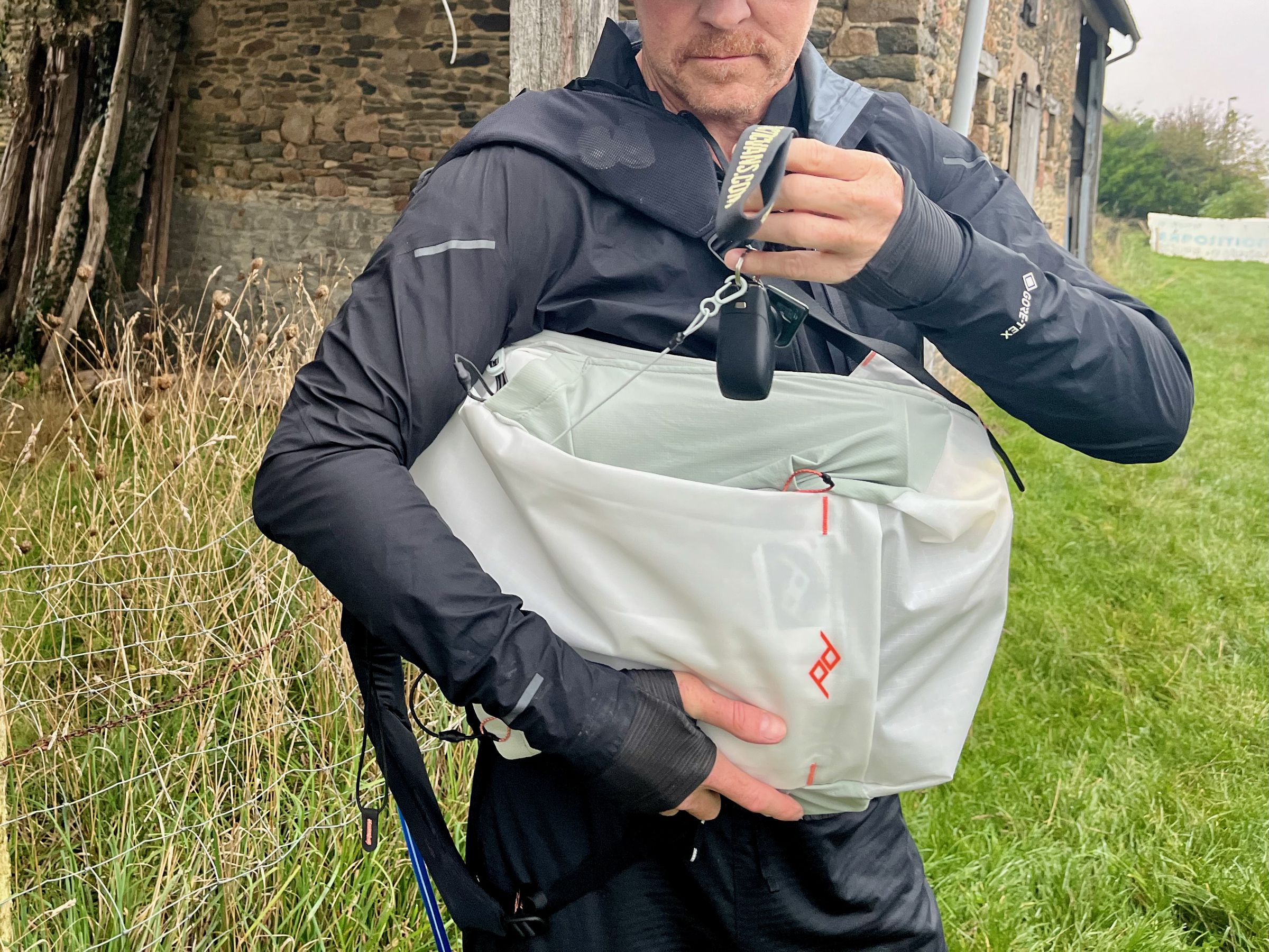 Accessing the key lanyard after a 15km hike while testing a few drones and carrying food and two liters of water for me and my dog, as well as a few layers of warm clothing and rain gear. The bag shape-shifted easily to accommodate the addition and removal of items throughout the day as the rain stopped and temperatures changed.