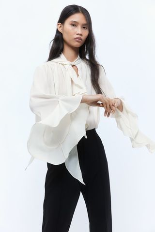 Flounce-Trimmed Tie-Neck Blouse