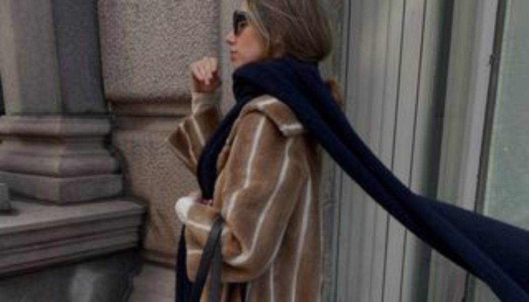 Chic, Timeless, and So Expensive Looking—This Luxe Scarf Style Is Destined to Dominate