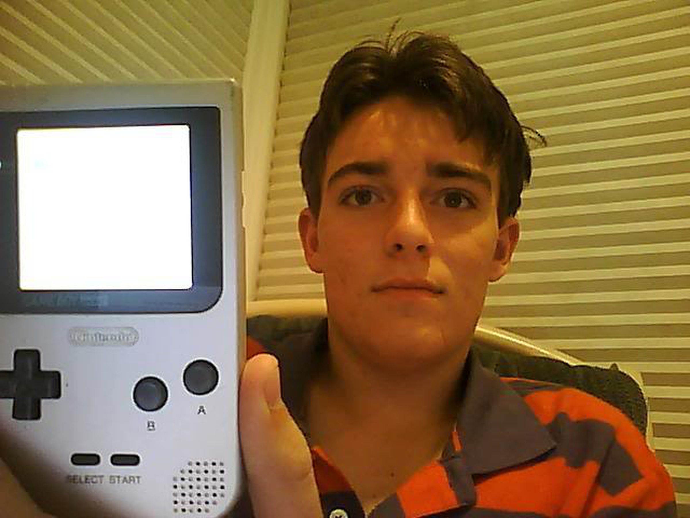 Palmer Luckey, age 16, with modded GB Pocket.