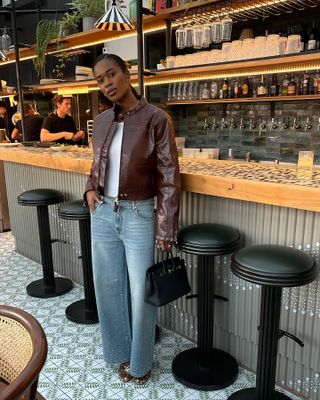 Influencer wears diamante jeans.