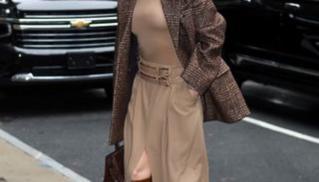 This Is the Most J.Lo Way to Style a Skirt With Boots