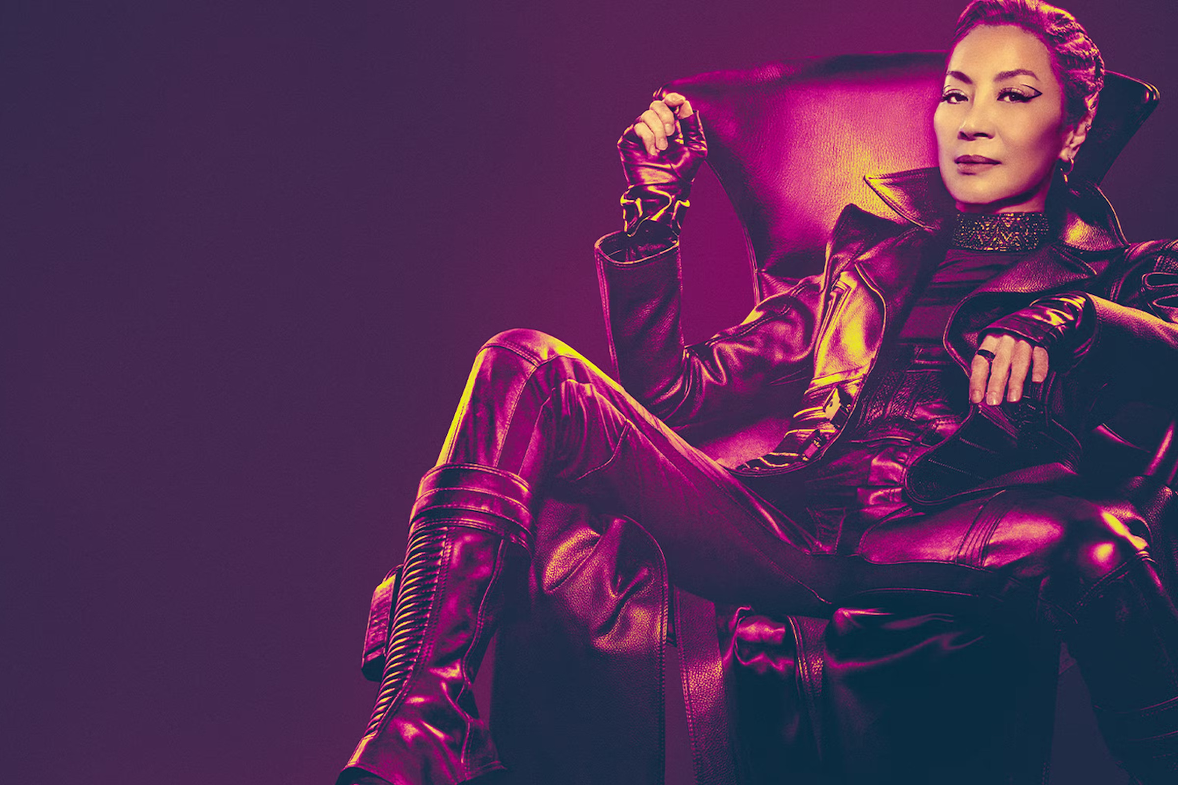 Stylized picture of Michelle Yeoh’s Emperor Philippa Georgiou sitting in a chair.