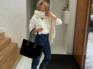 Anouk Yve with a black By Malina tote bag.