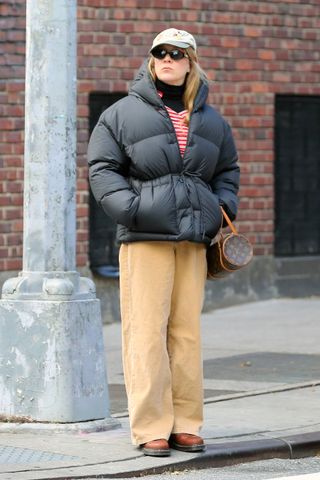 Chloe Sevigny wears a puffer jacket